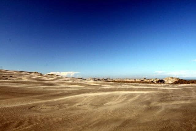 Sand blowing over Farewell Spit
