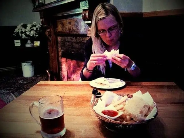 Vera trying a whitebait sandwich