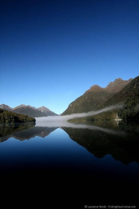 Mountain lake cloud reflections