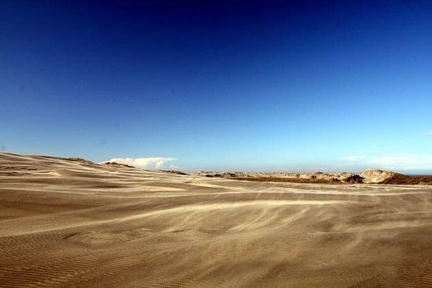 Sand blowing over Farewell Spit