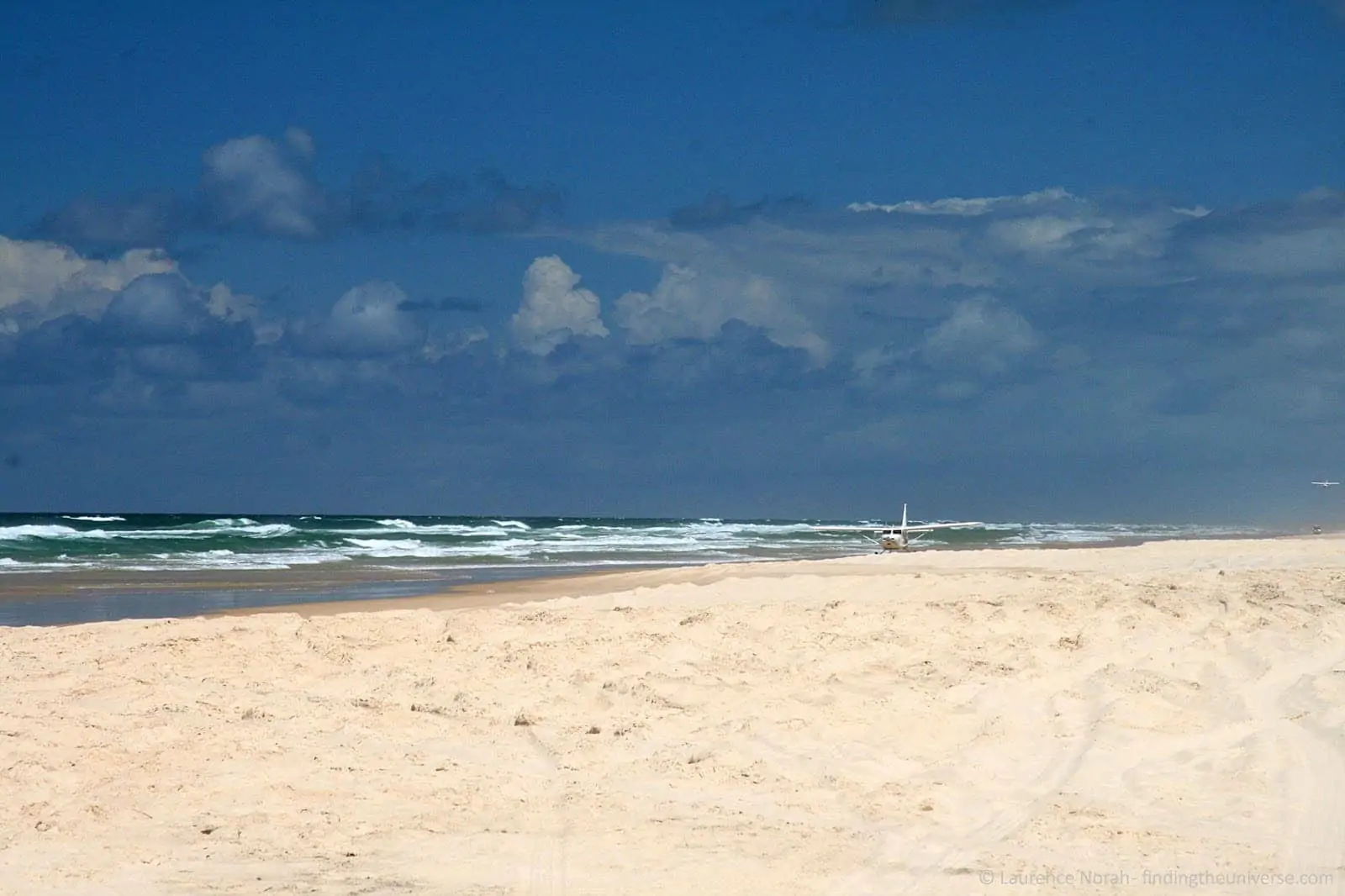 Plane landing on beach Fraser Island Australia.png