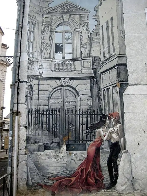 Street Art French Angouleme Couple embracing on wall.png Street Art French Angouleme Couple embracing on wall.png