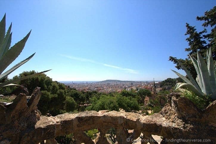 View across Barcelona from Parc Guell with Montjuic Hill in background