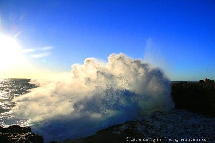 Wave crashing on rocks