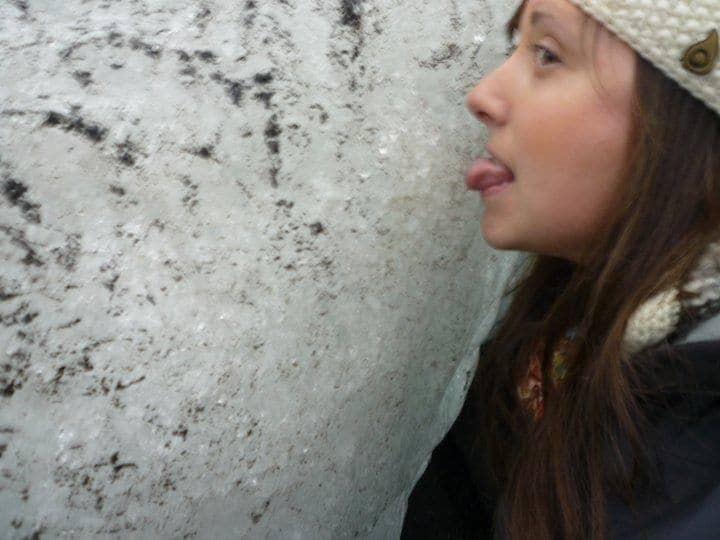 cailin licking glacier in iceland