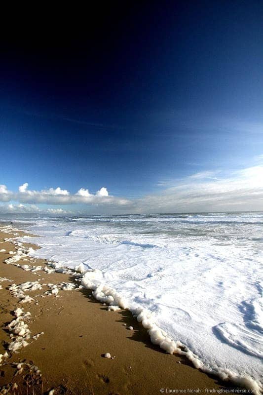 Foamy beach near Karamea