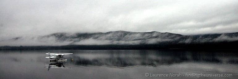 Sea plane on misty lake