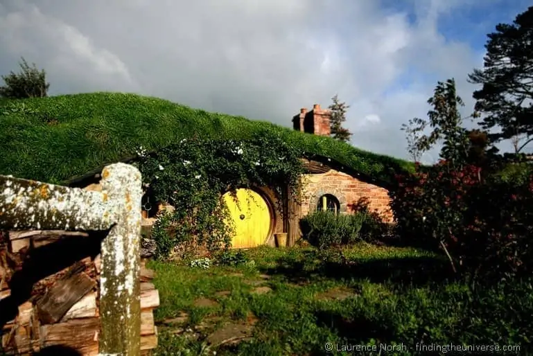 Yellow Hobbit hole in hobbiton New Zealand