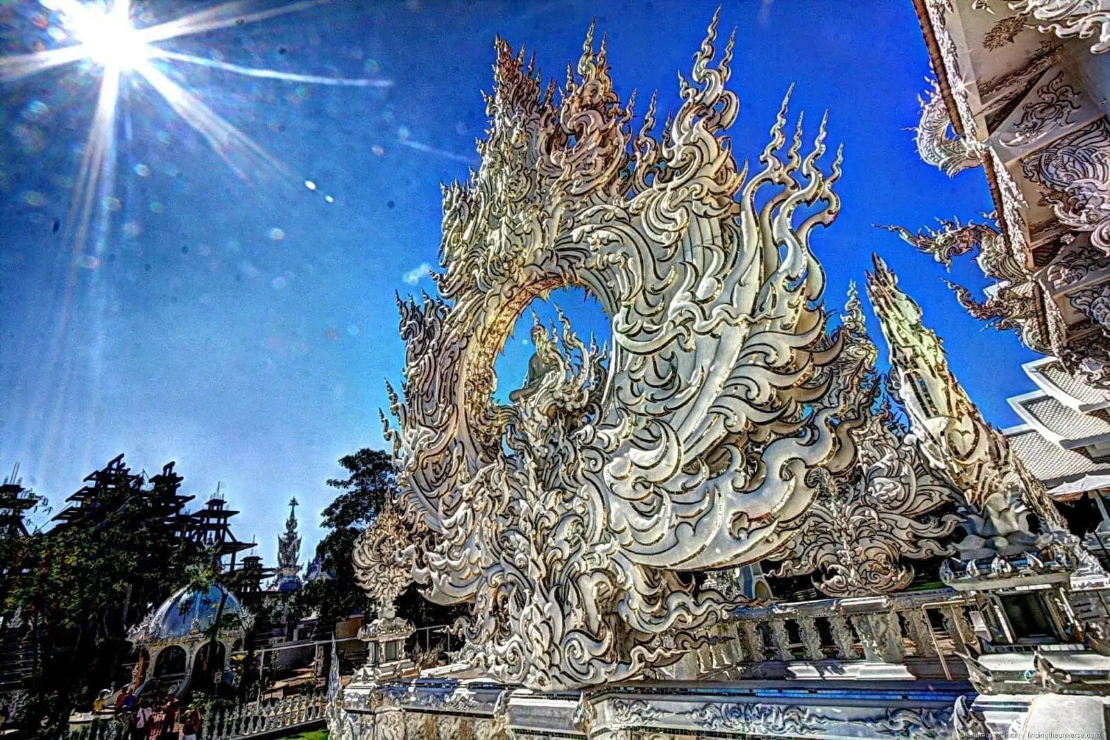 White temple sculpture sun Chiang Rai Thailand White temple sculpture sun Chiang Rai Thailand