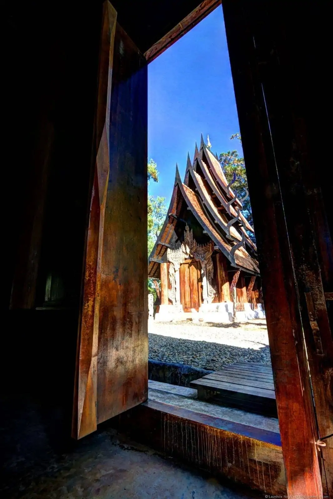 Black temple Chiang Rai doorway