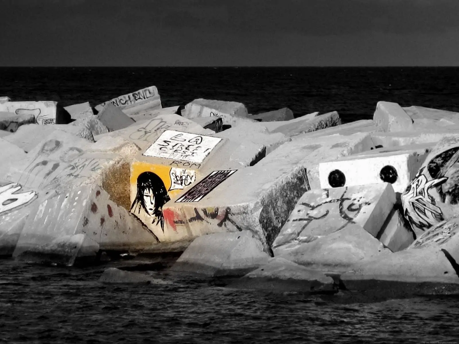Street art breakwall Barcelona
