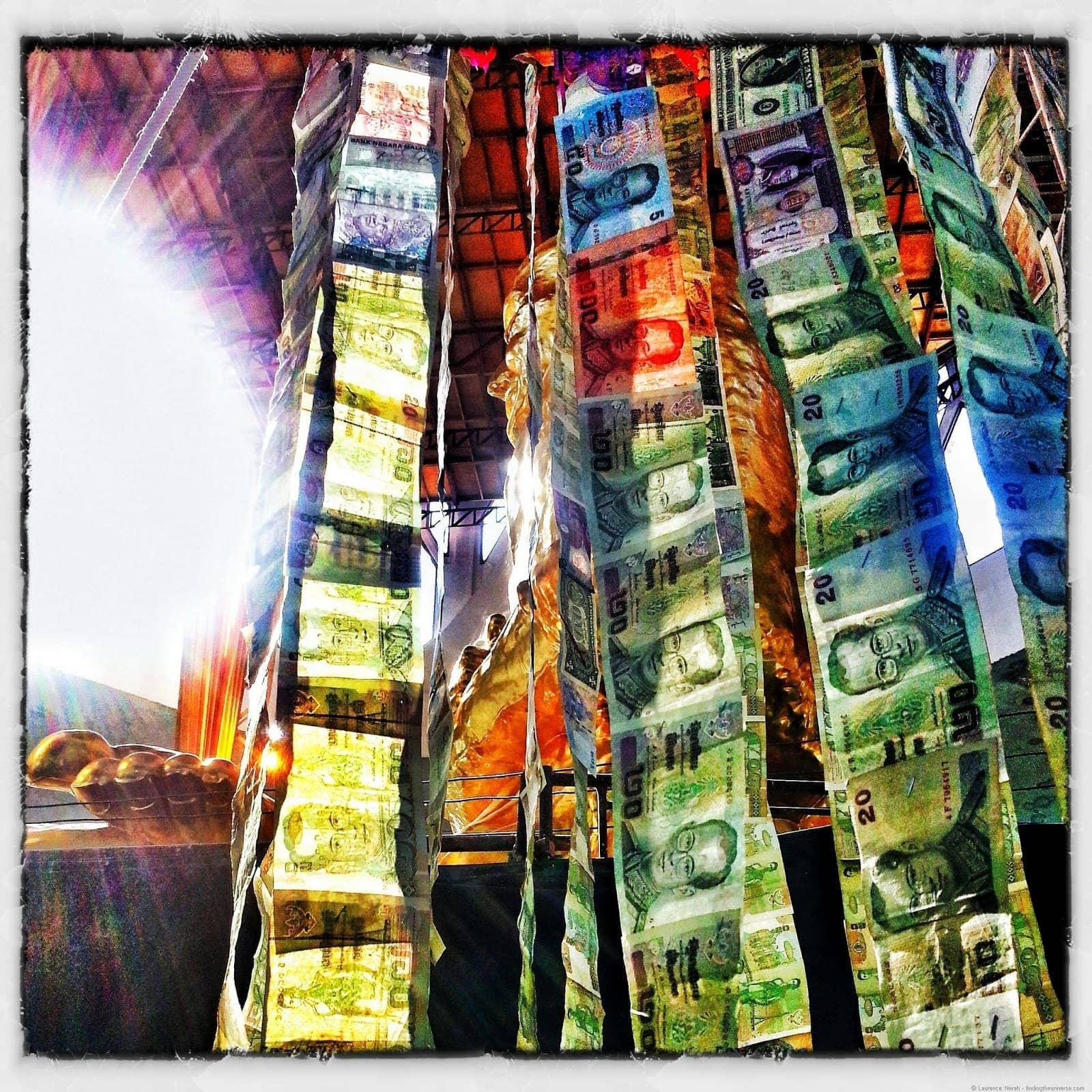 Strings of money in Thai temple