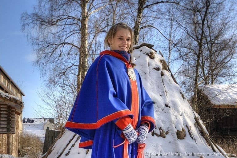 Girl in traditional Norwegian dress landscape