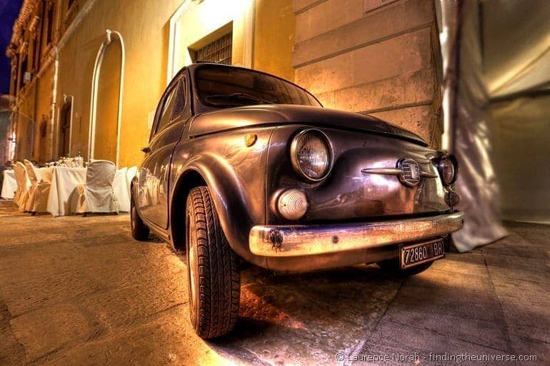 car back street restaurant tables italy fiat