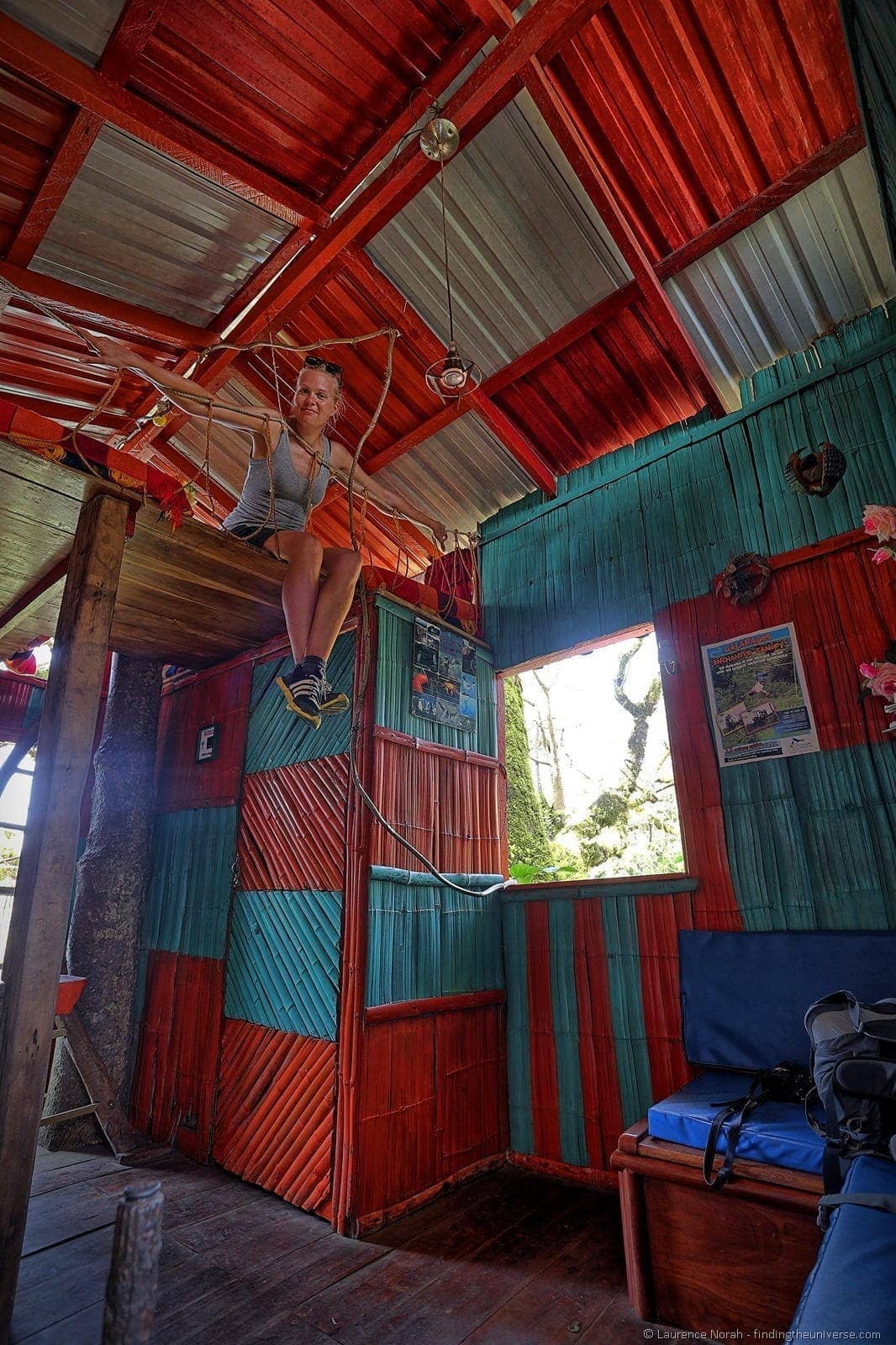 Vera in treehouse interior San Cristobal Island Galagagos Ecuador