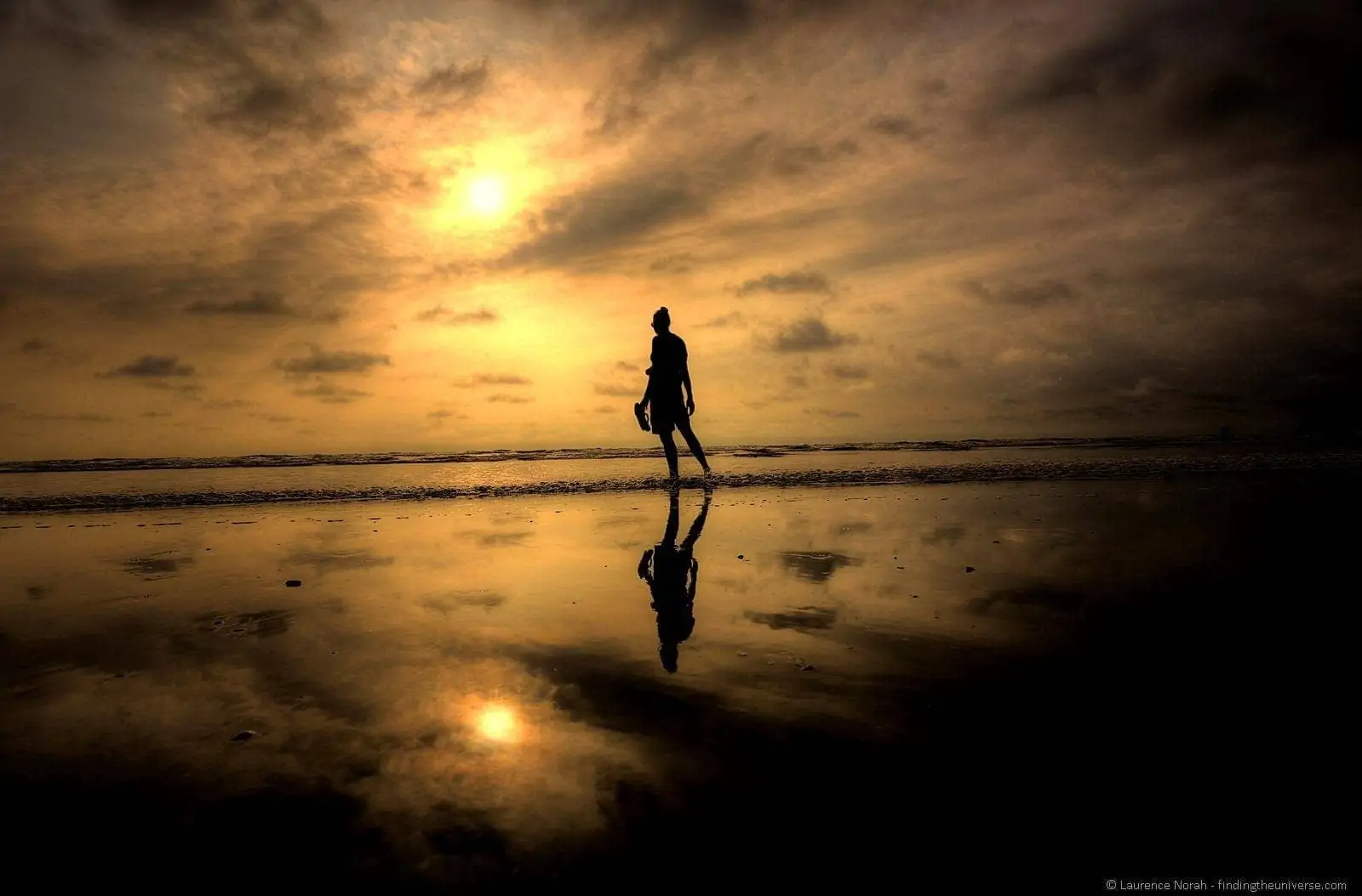 Girl at sunset reflection Canoa Ecuador 2