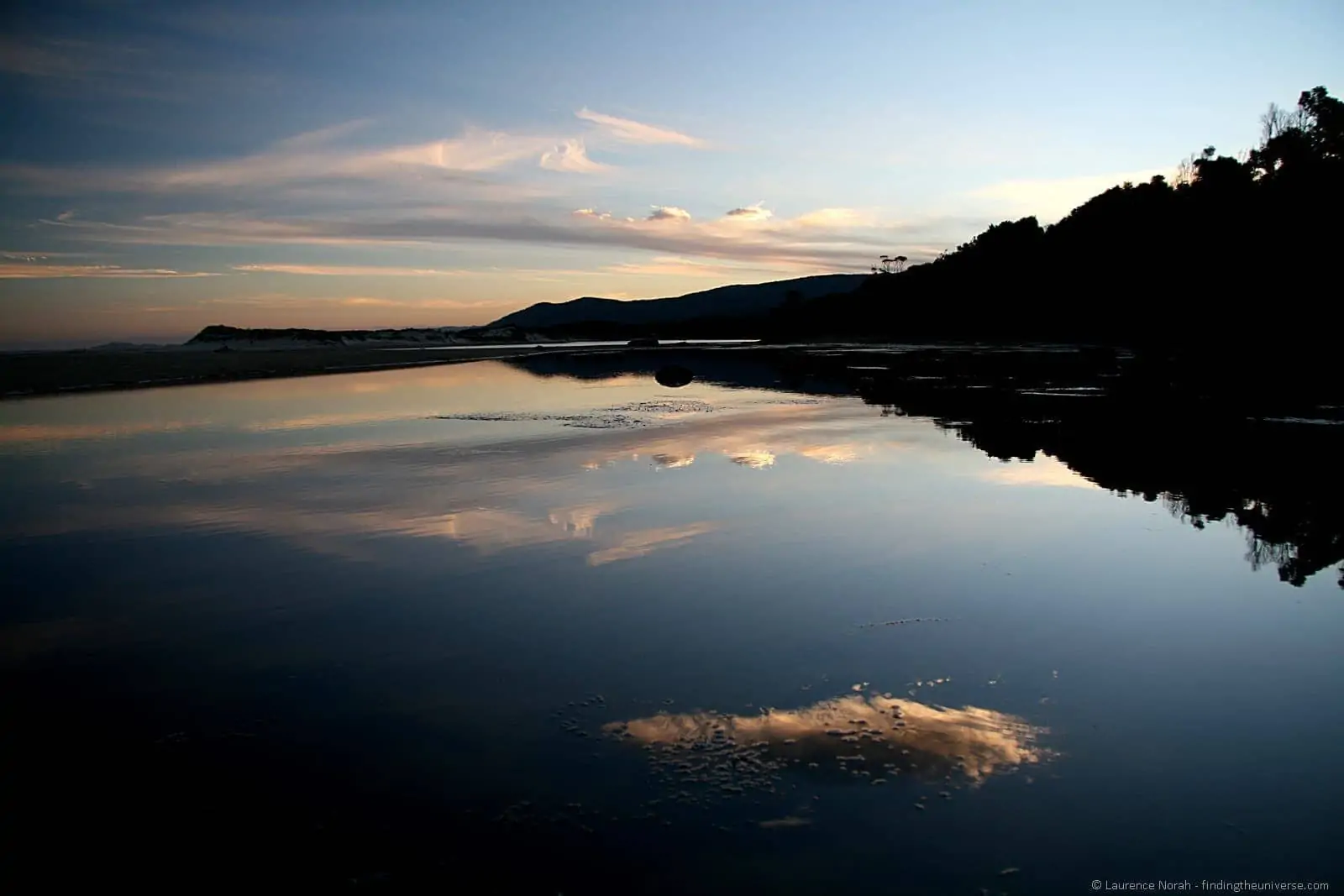 Cloud reflection lagoon beach Tasmania