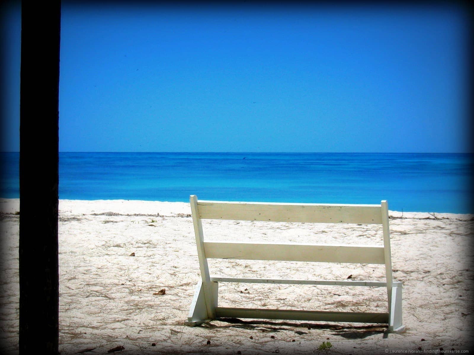 bench on beach seychelles