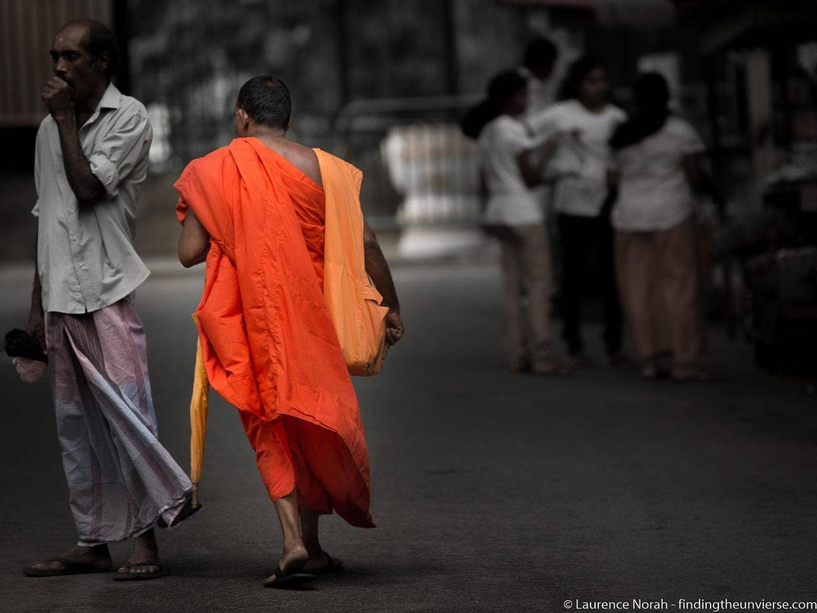 Monk walking Sri Lanka scaled