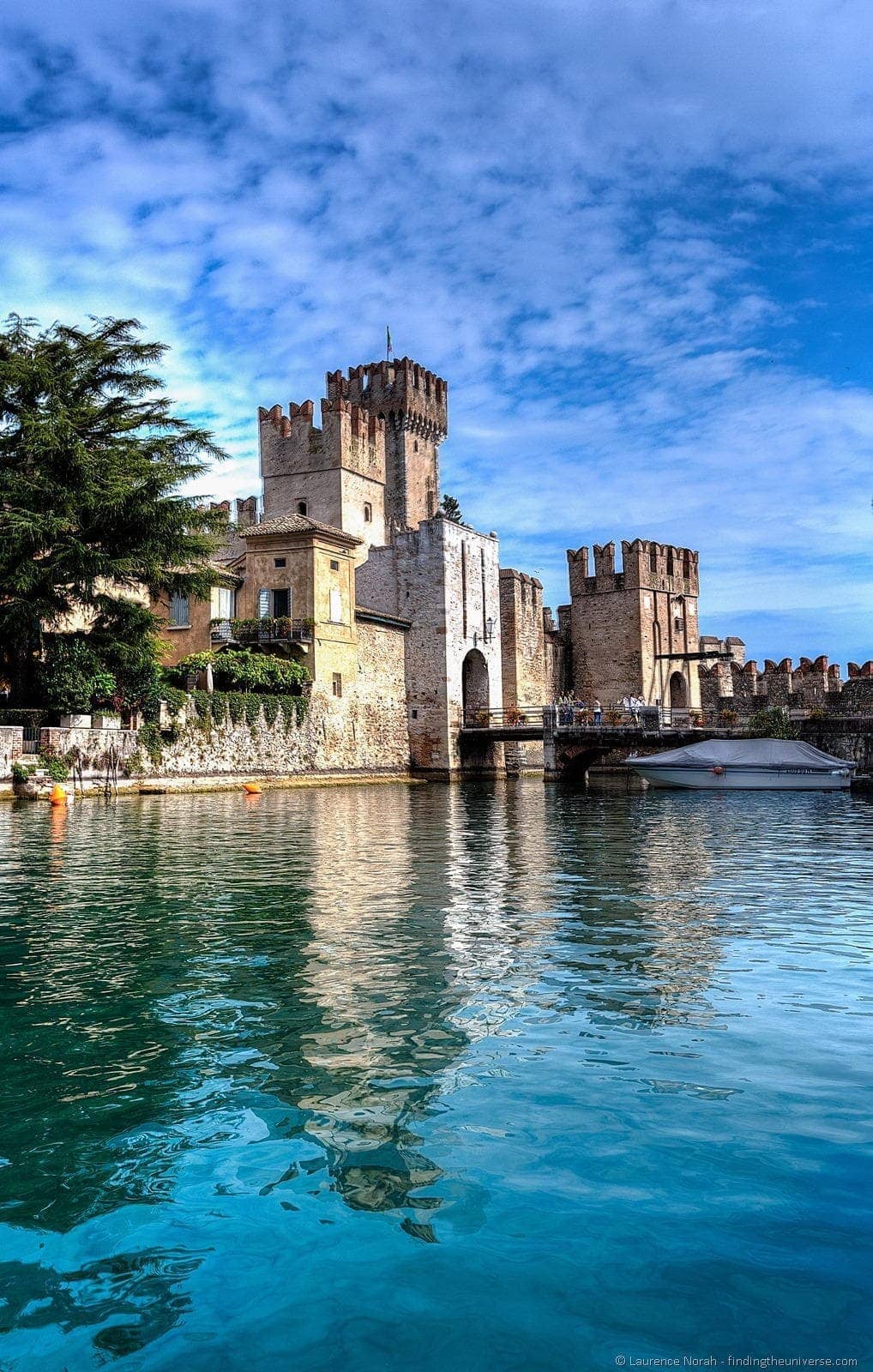 Scaliger castle from moat reflection italy garda lake