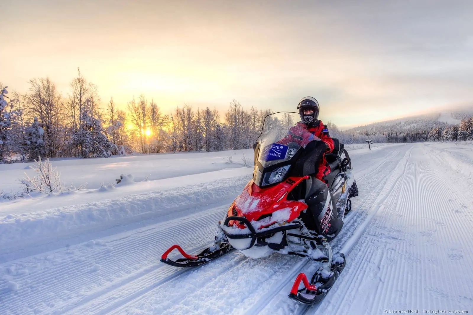 girl snowmobile Iso Syote lapland sunset finland girl snowmobile Iso Syote lapland sunset finland