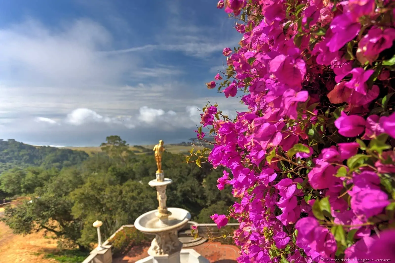 Hearst Castle golden statue California flowers