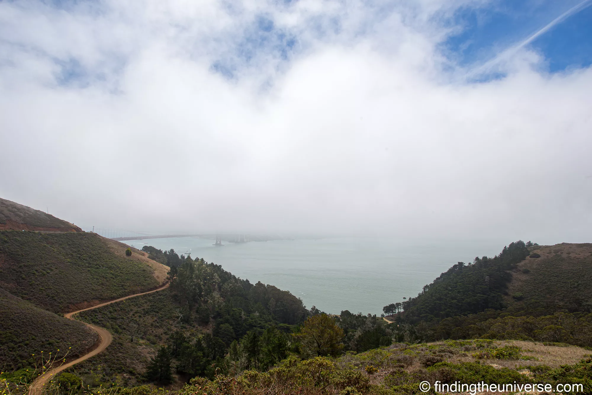View from Hawk Hill, Marin Headlands, with low cloud completely obscuring the Golden Gate Bridge and bay
