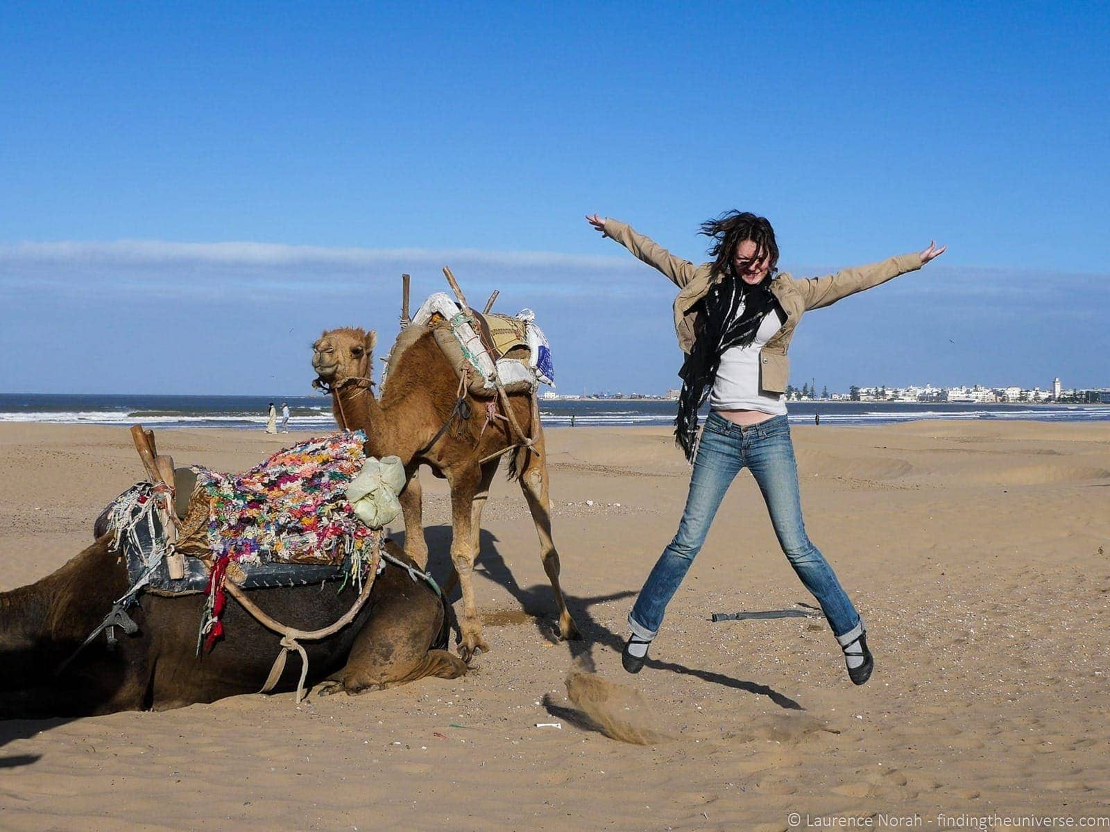 Jumping in front of a camel Morocco