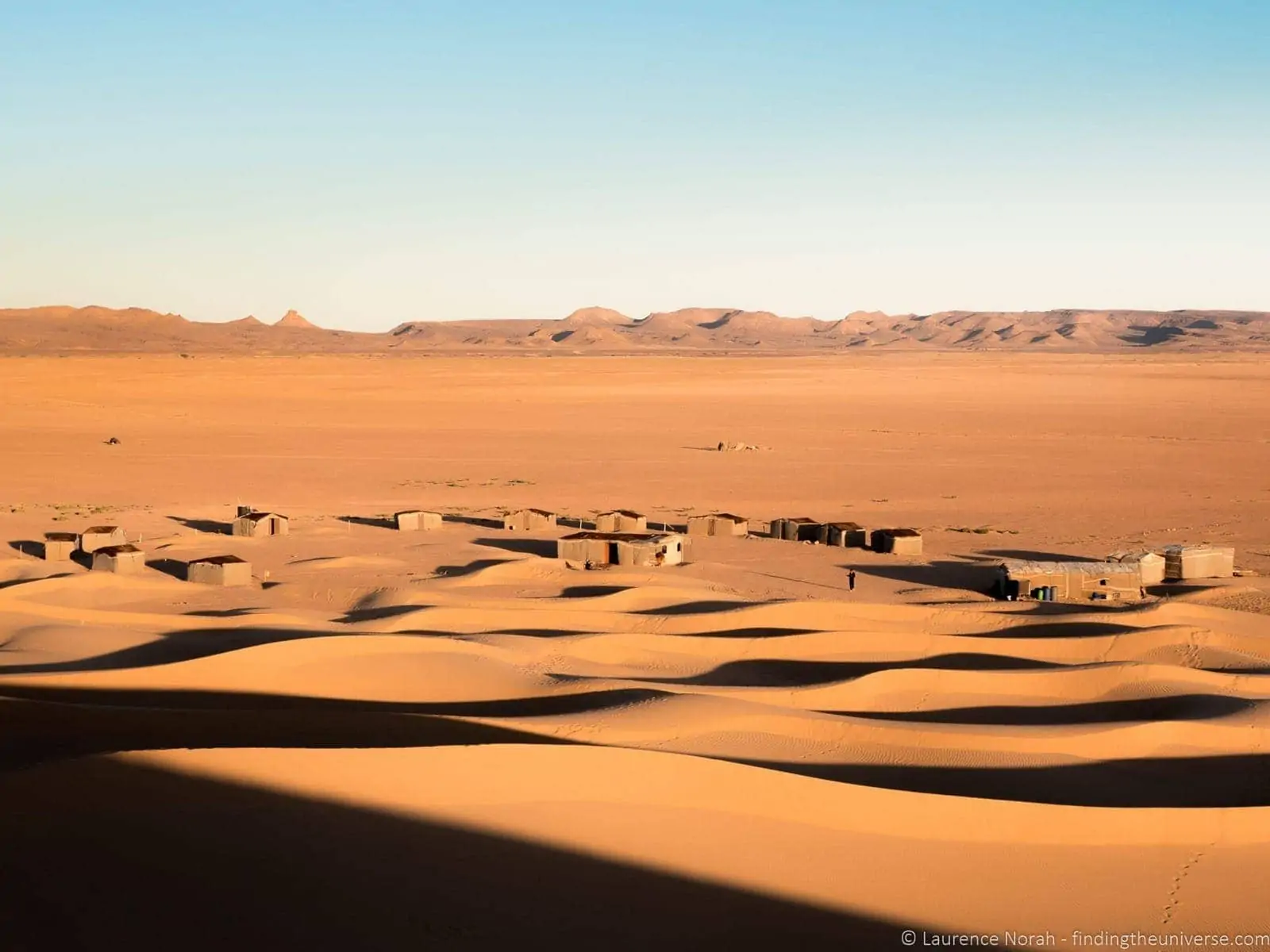 Sand dunes and village Sahara Morocco Sand dunes and village Sahara Morocco