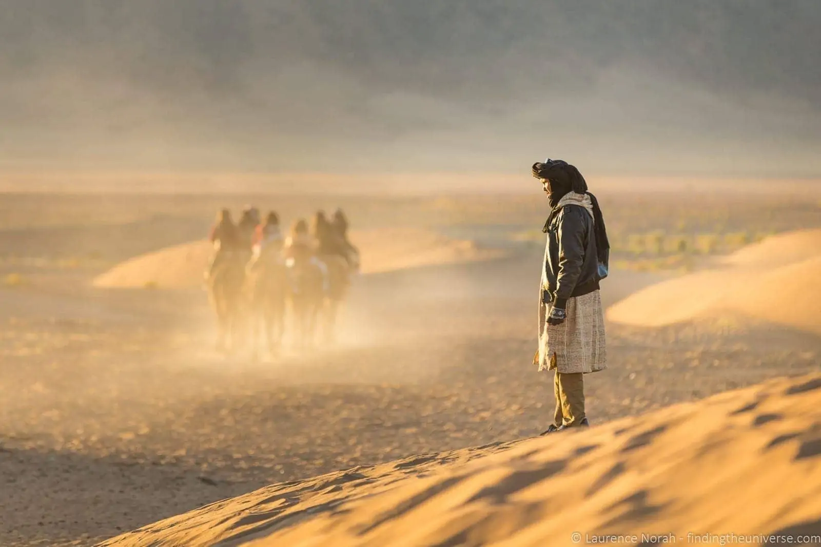 Camel and berber in desert Morocco Camel and berber in desert Morocco