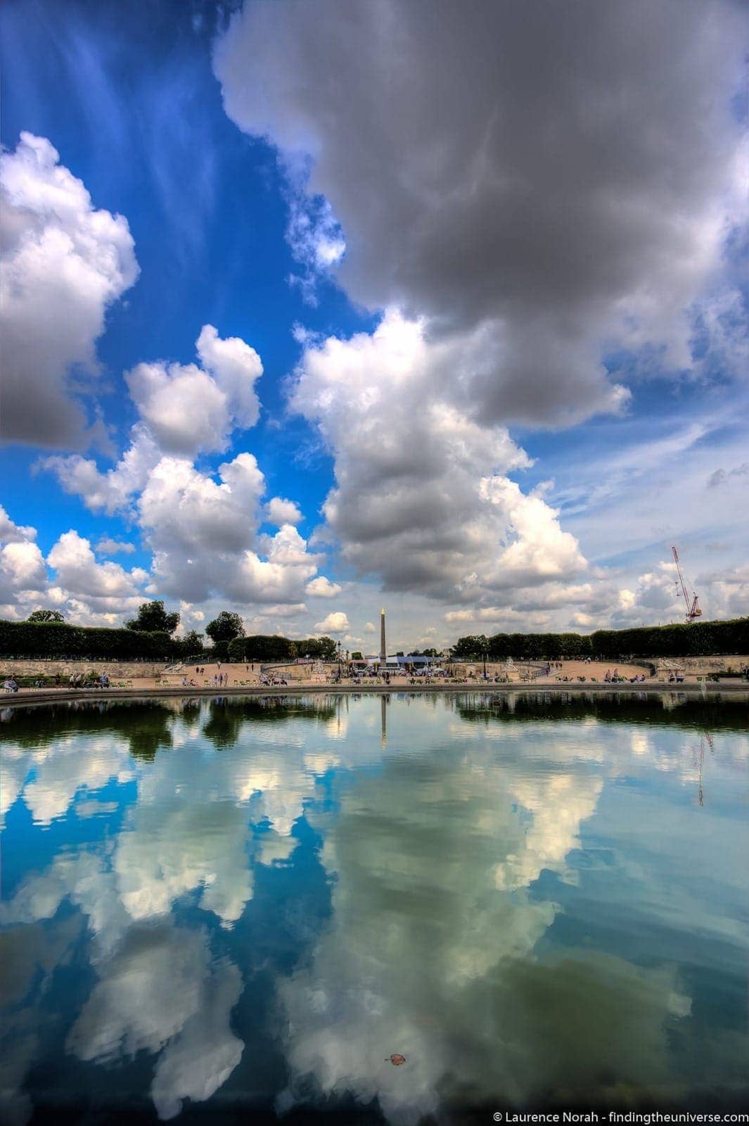 Paris place concorde reflected in tuileries pond - scaled