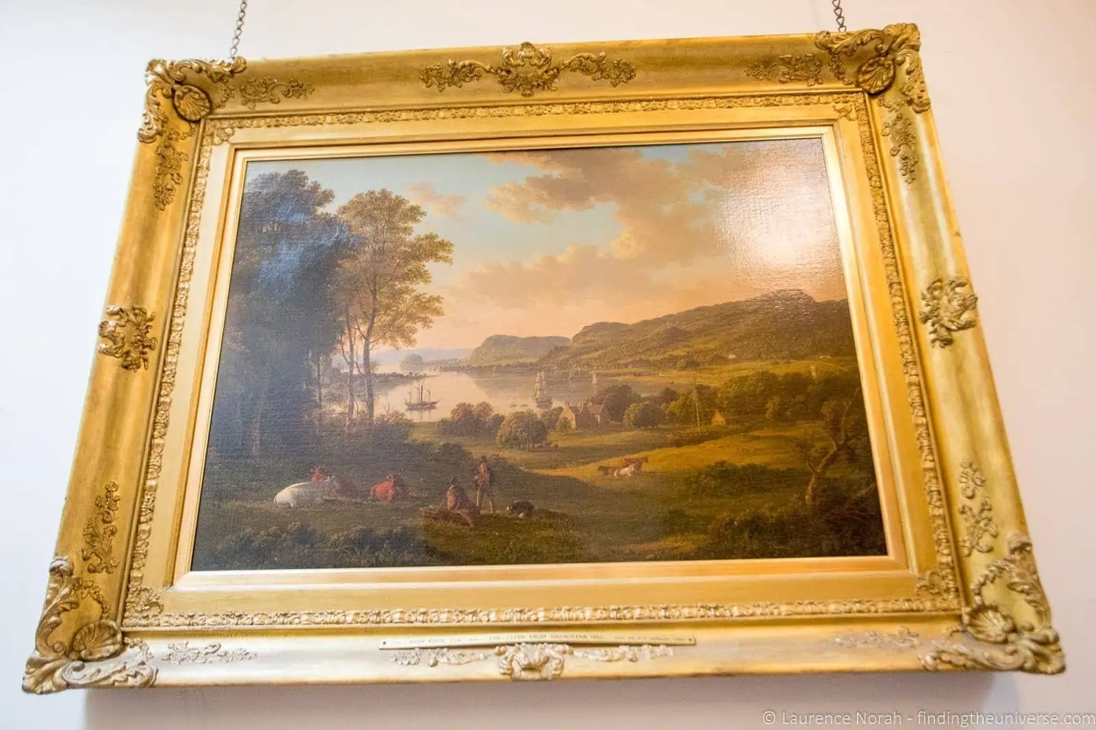 Interior of Pollok House upstairs sitting room with period furniture and oil paintings