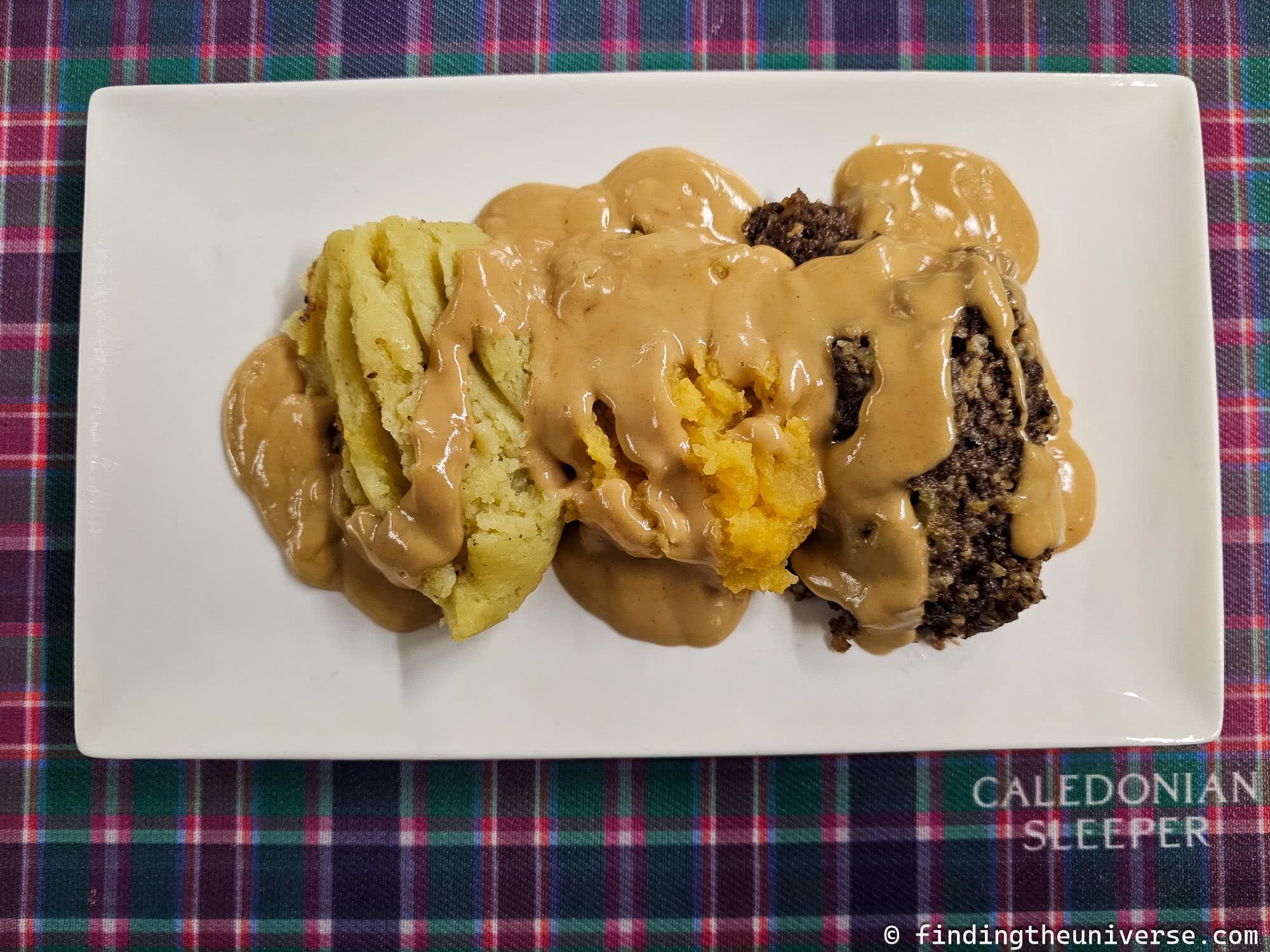 Caledonian Sleeper train dinner haggis neeps and tatties by Laurence Norah