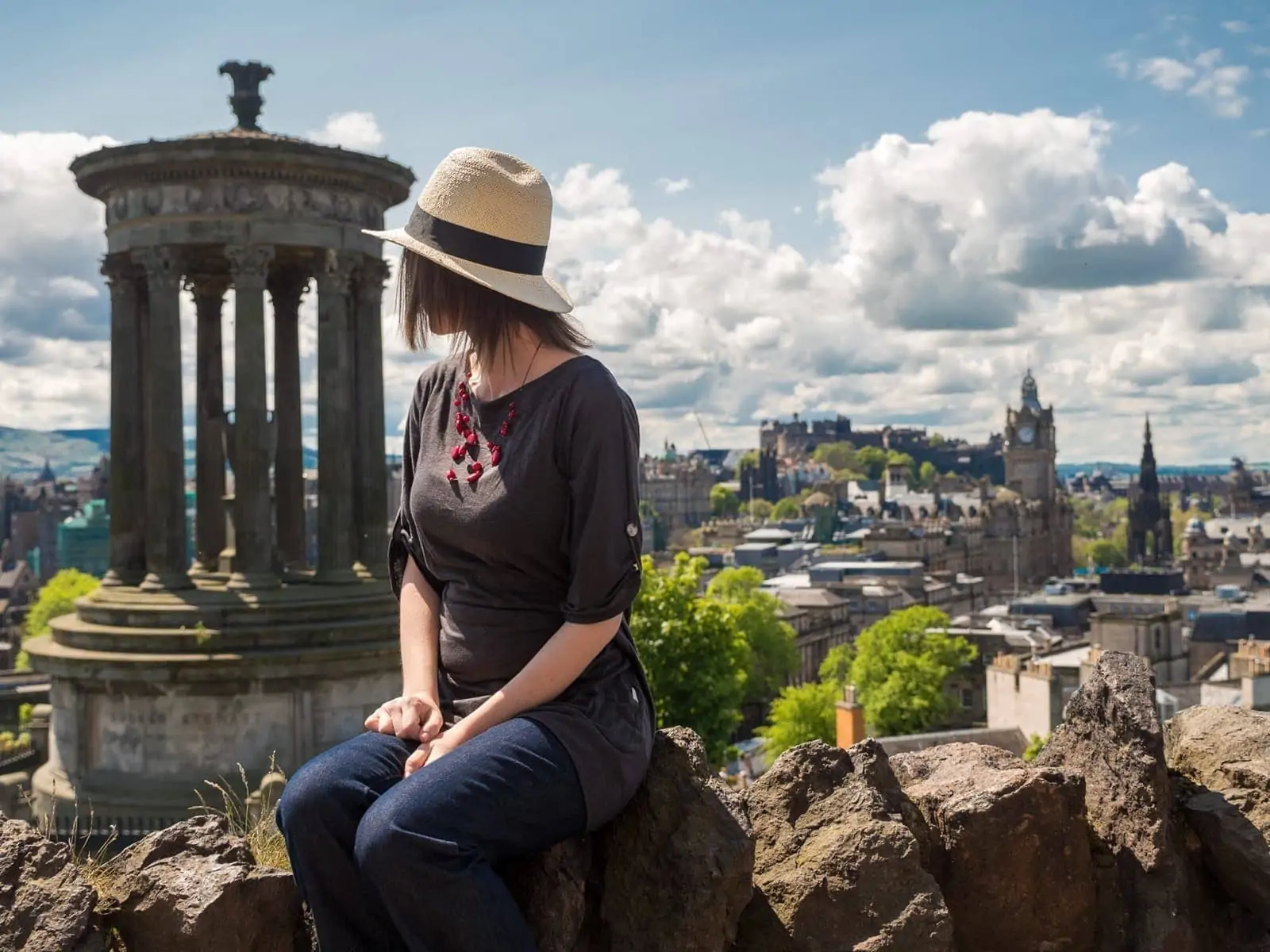 Jessica looking out from Calton Hill Edinburgh with Dugald Stewart Monument