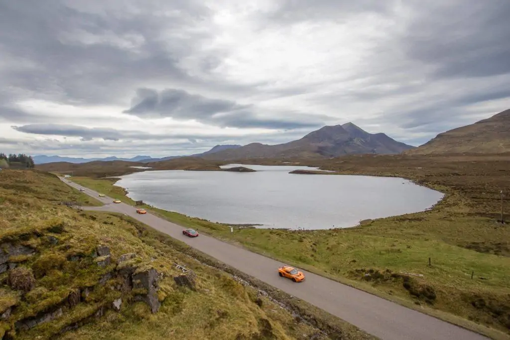 Cars on the road on Scotland's North Coast 500