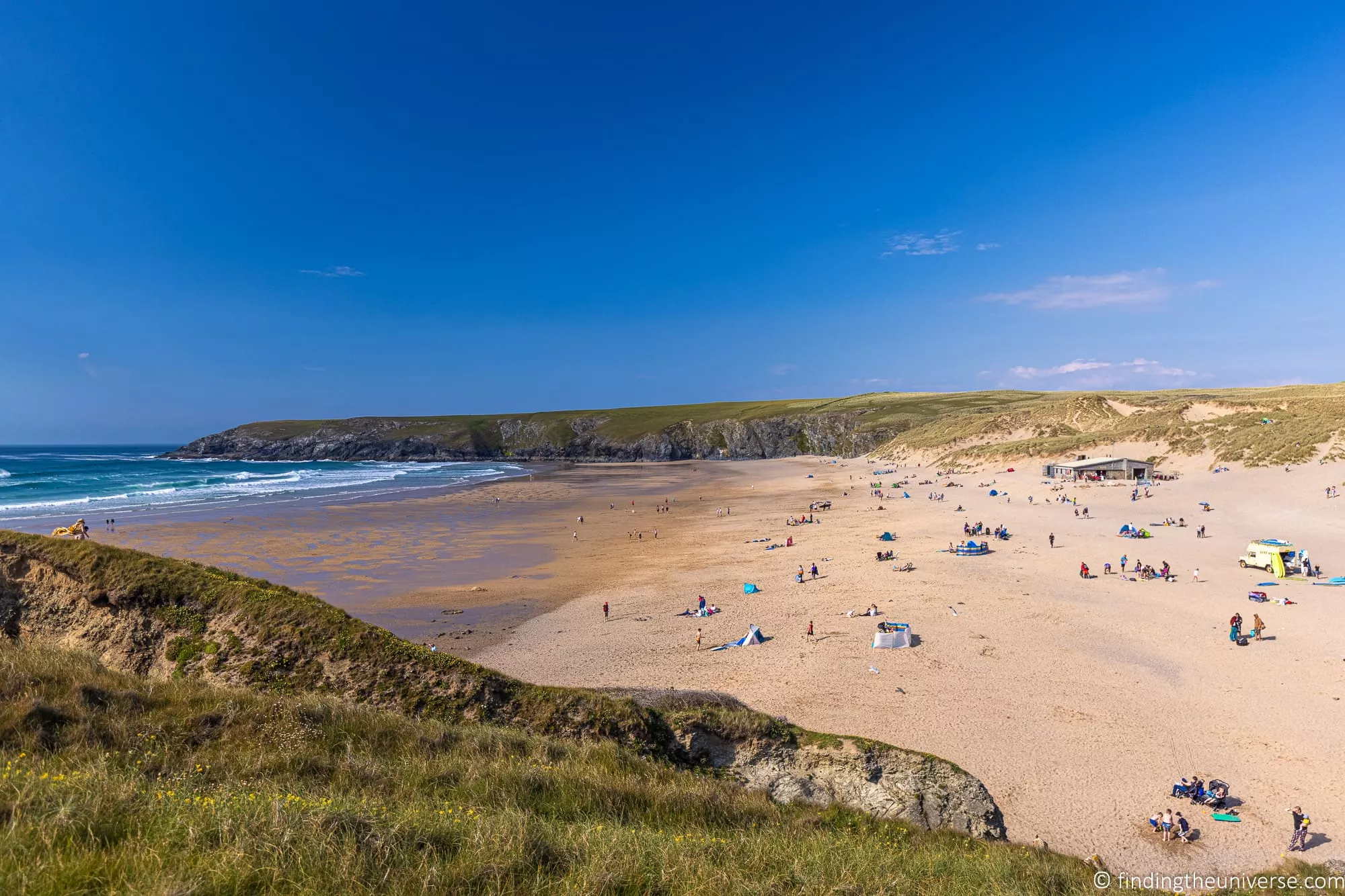 The wide sandy beach at Holywell Bay in Cornwall