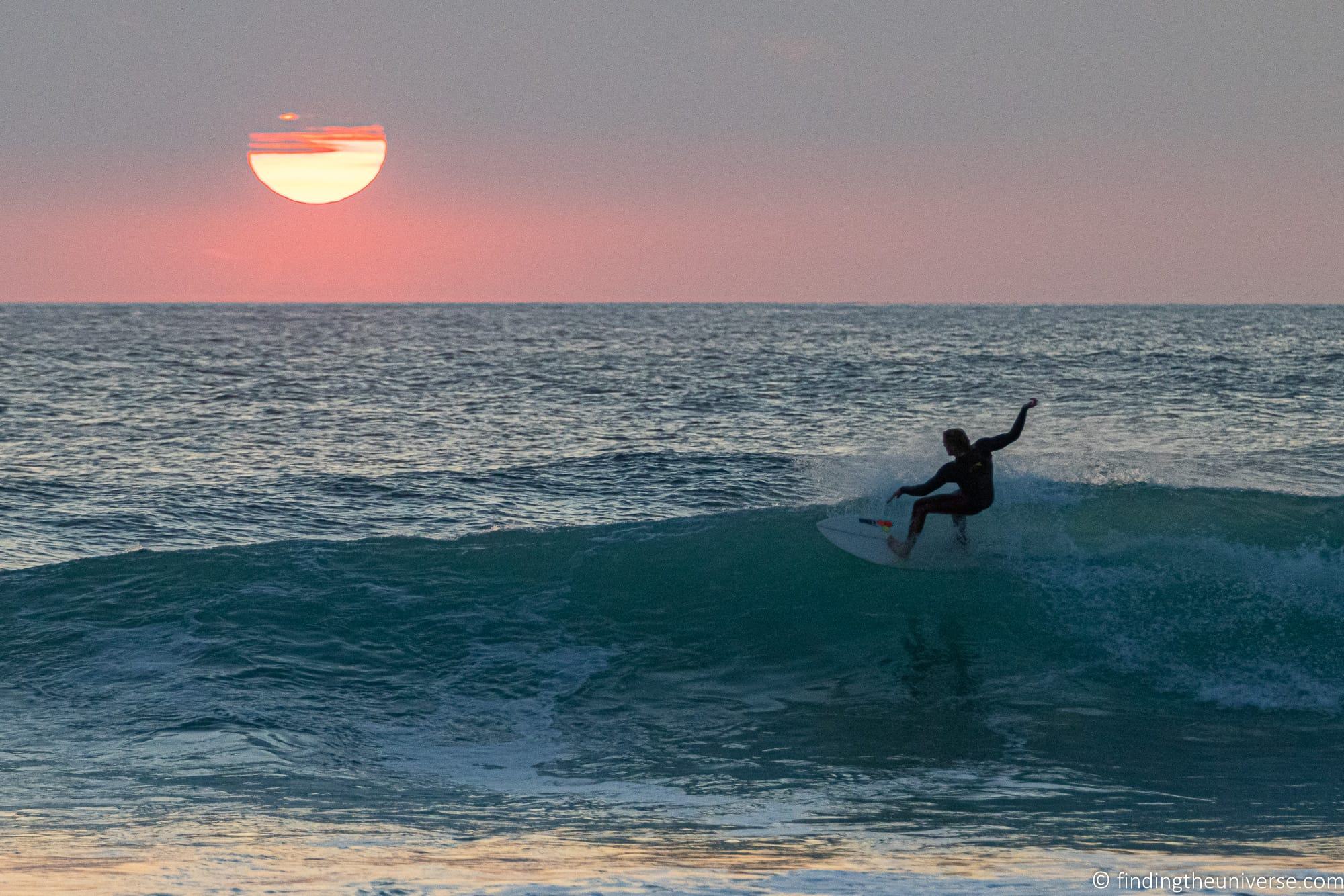 Surfer at sunset Cornwall