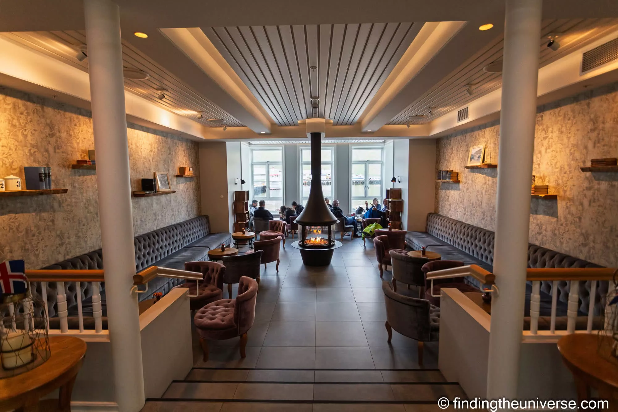 The lounge at Sigló Hótel, with its central fireplace