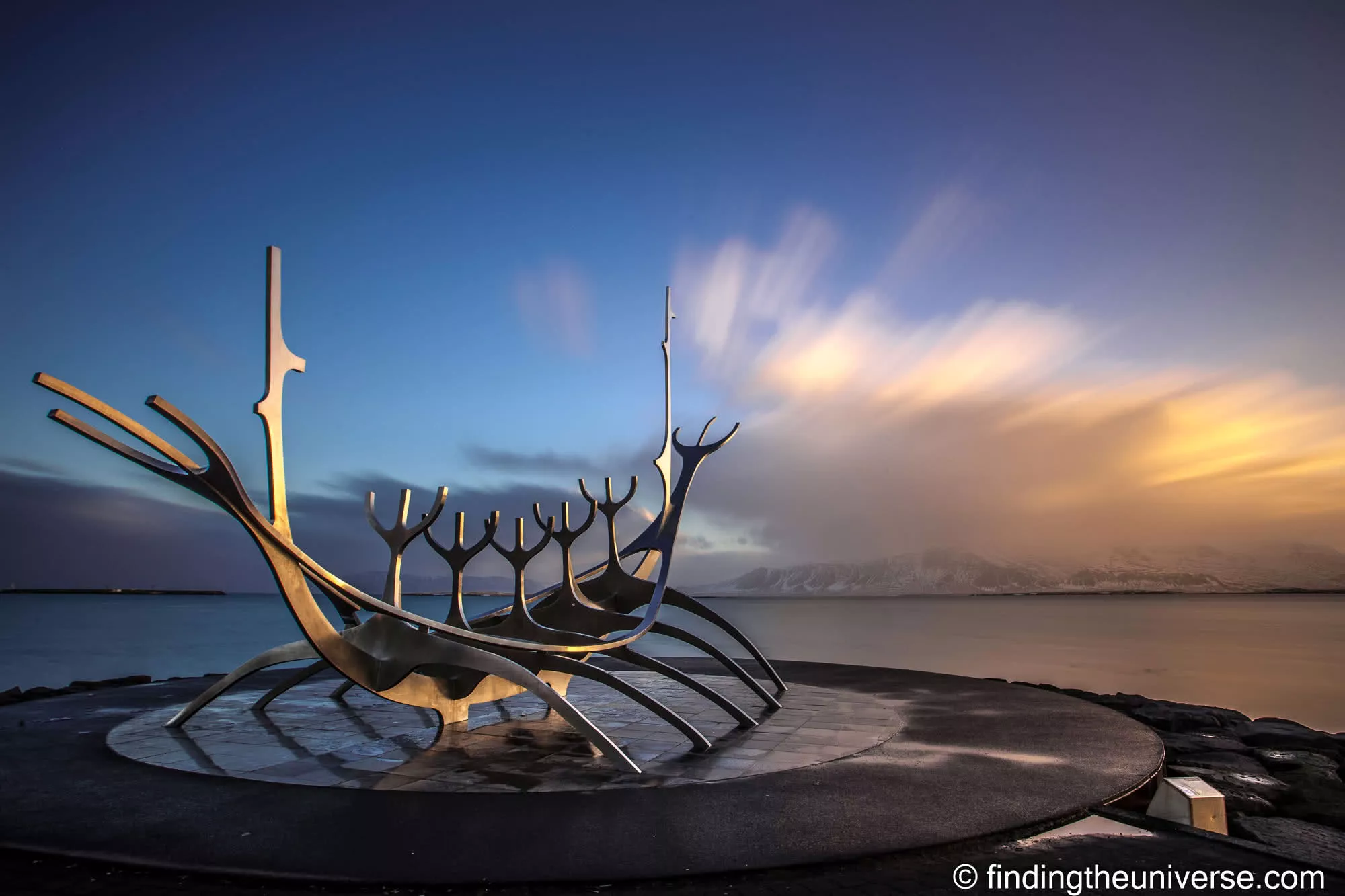 The Sun Voyager Statue in Reykjavi, Iceland at sunrise long exposure by Laurence Norah-2