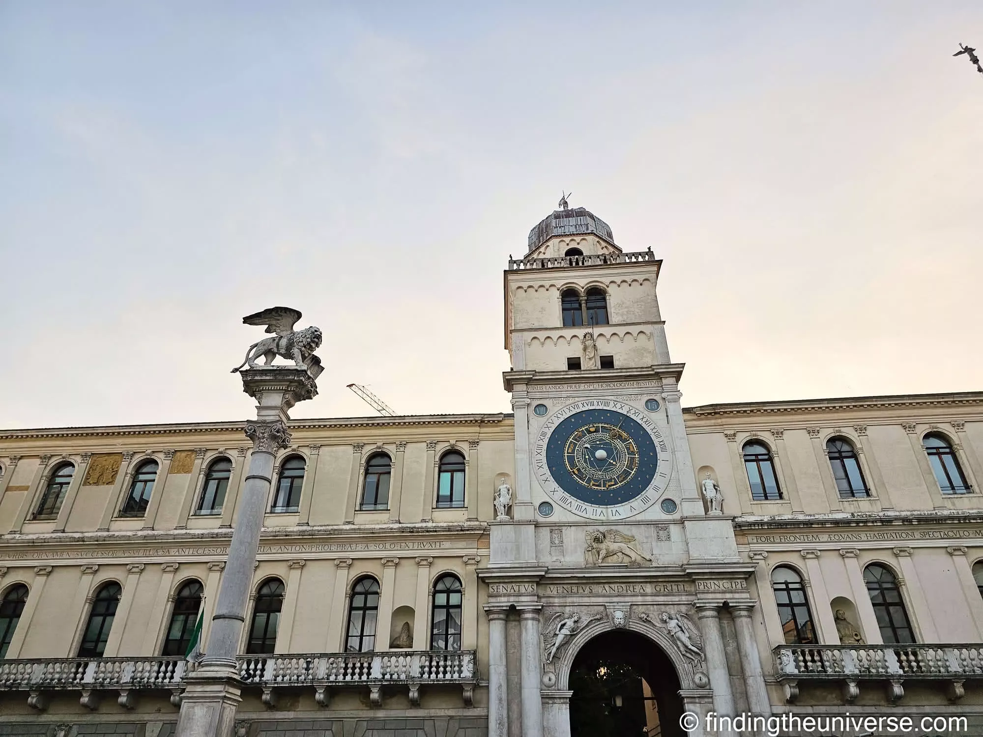 The astronomical clock and winged lion of St Mark above Piazza dei Signori in Padua