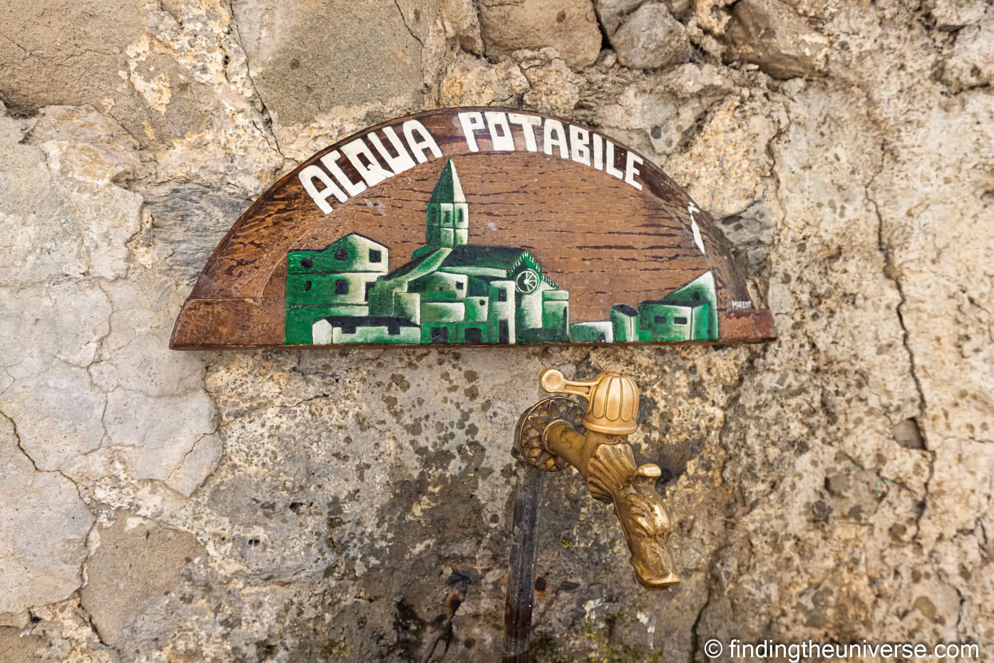 A public drinking-water fountain marked Acqua Potabile in a Cinque Terre village