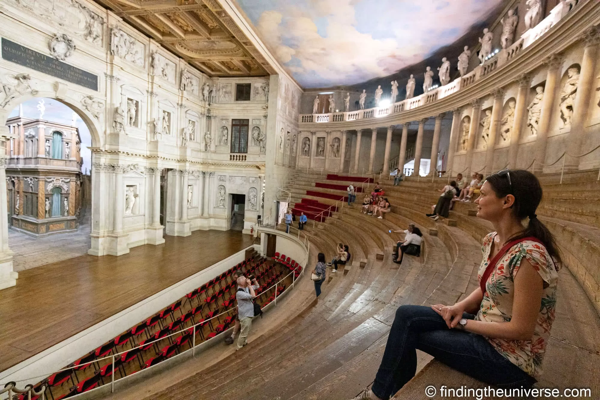 Jess seated in the wooden auditorium of the Teatro Olimpico in Vicenza