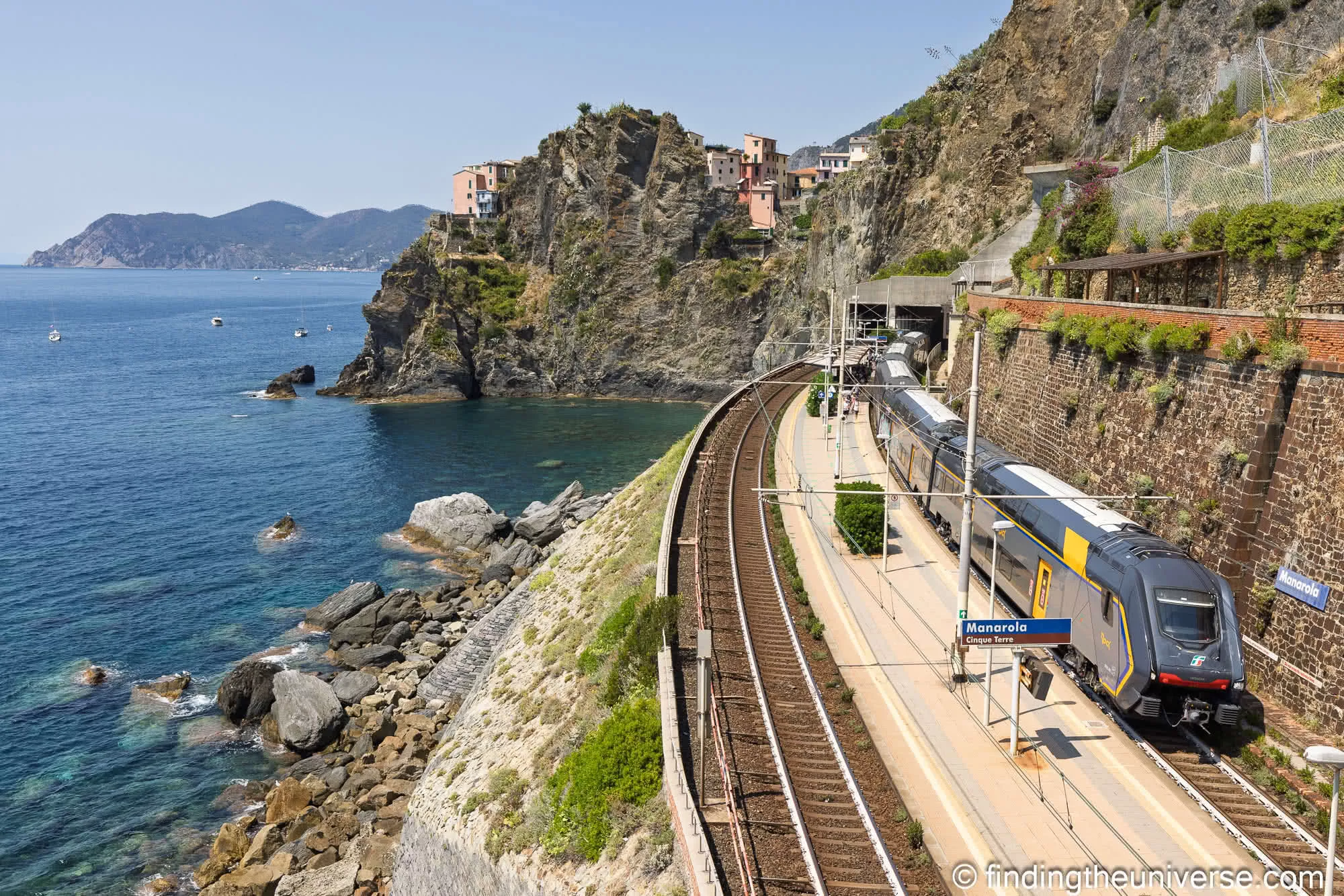 A train at Manarola station on the Cinque Terre coastal railway