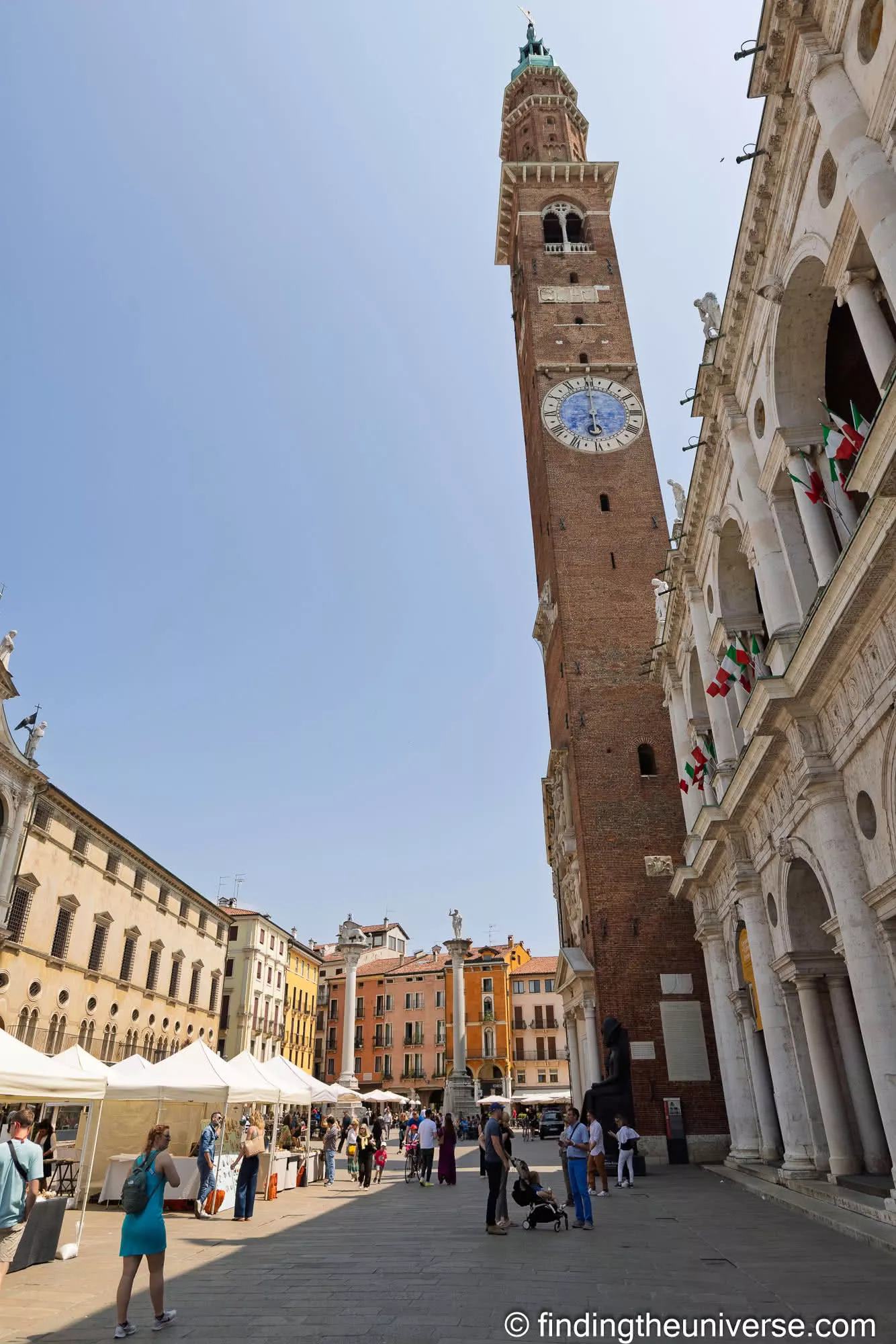 Market stalls and the clock tower in Piazza dei Signori, Vicenza