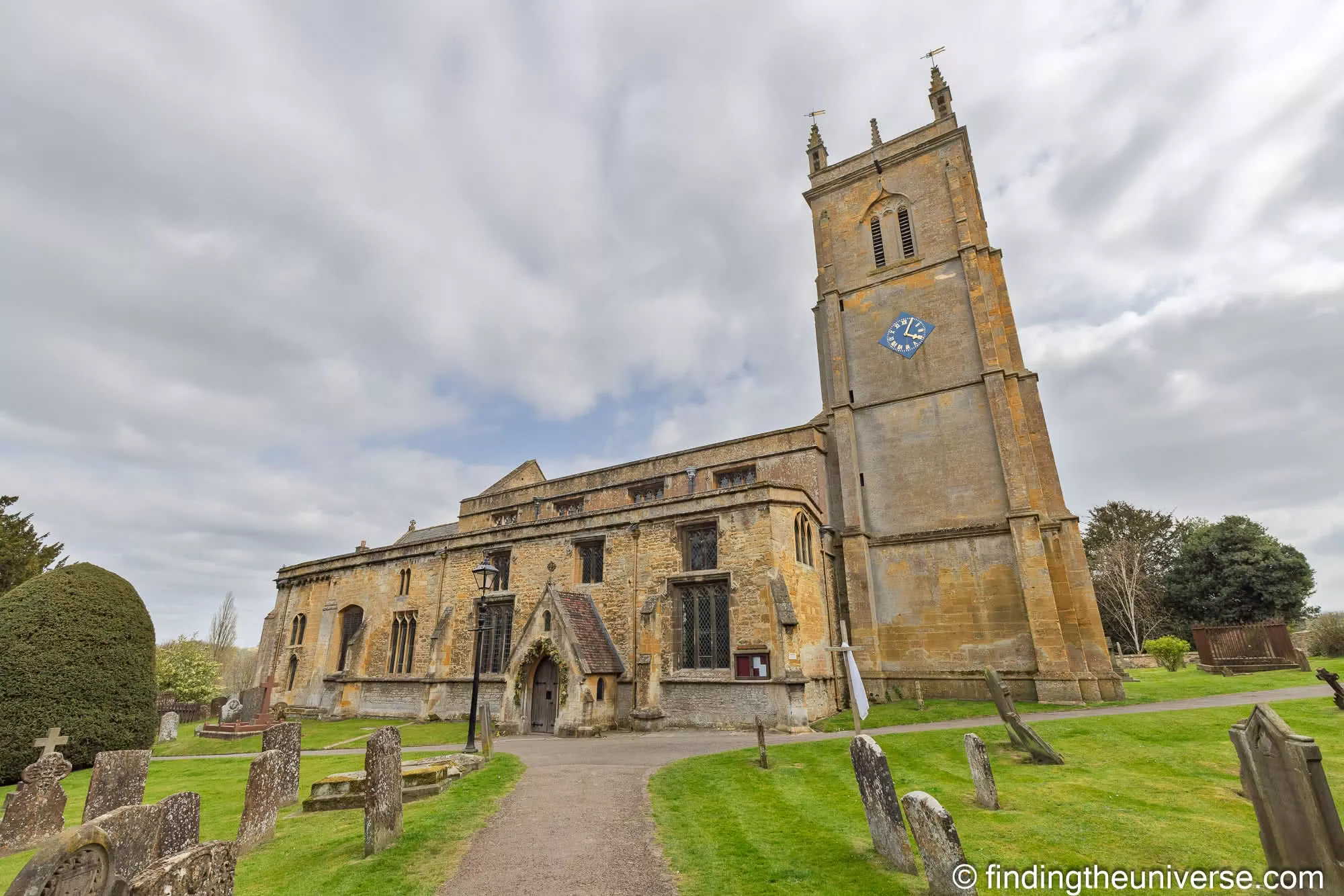 Blockley church tower with its blue clock