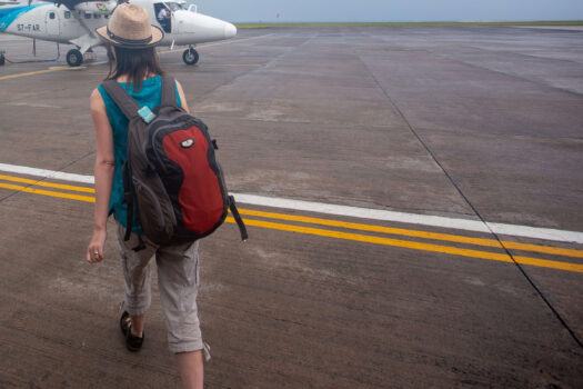 Eagle Creek daypack on the airport apron in the Seychelles