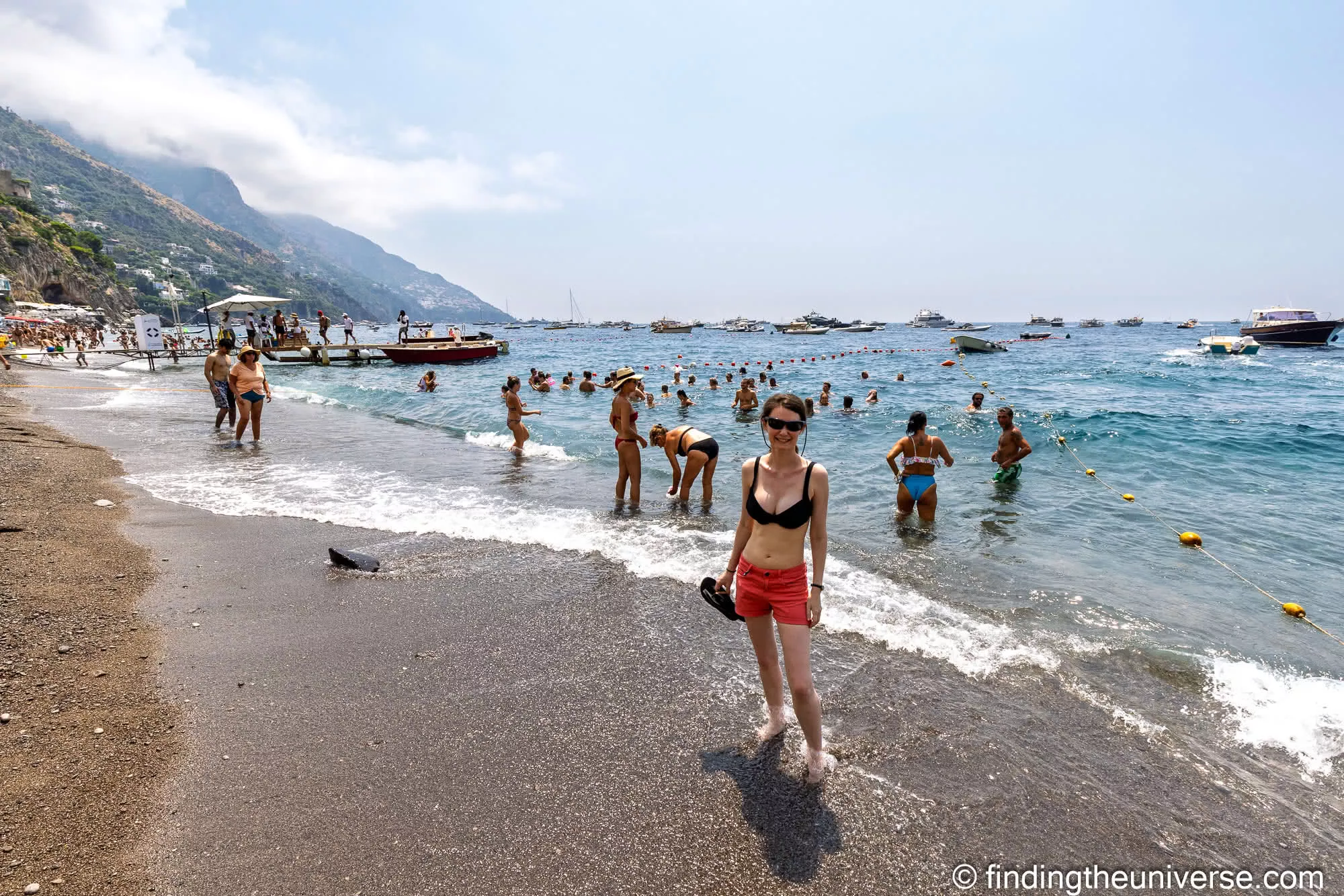 Jess at the water's edge on Positano's Spiaggia Grande