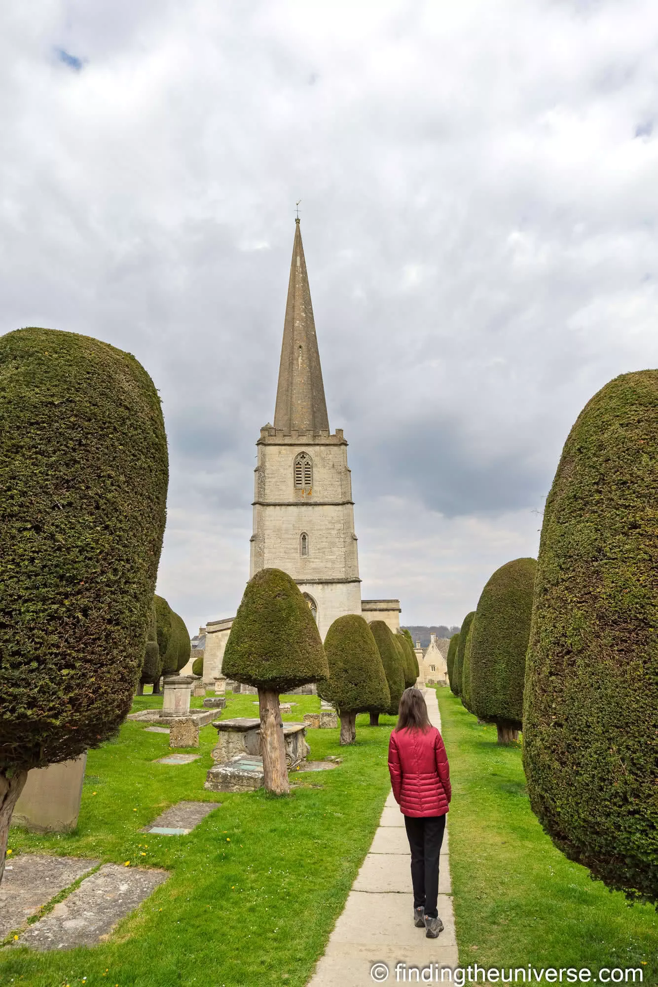 Painswick churchyard yew avenue to the spire
