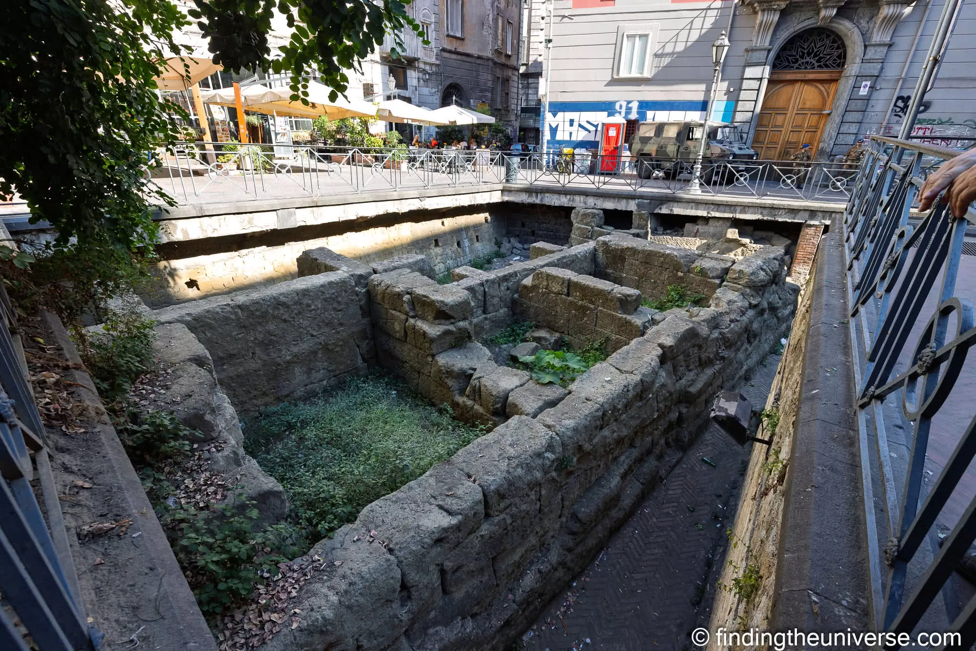 Ancient Greek city walls exposed below Piazza Bellini in Naples