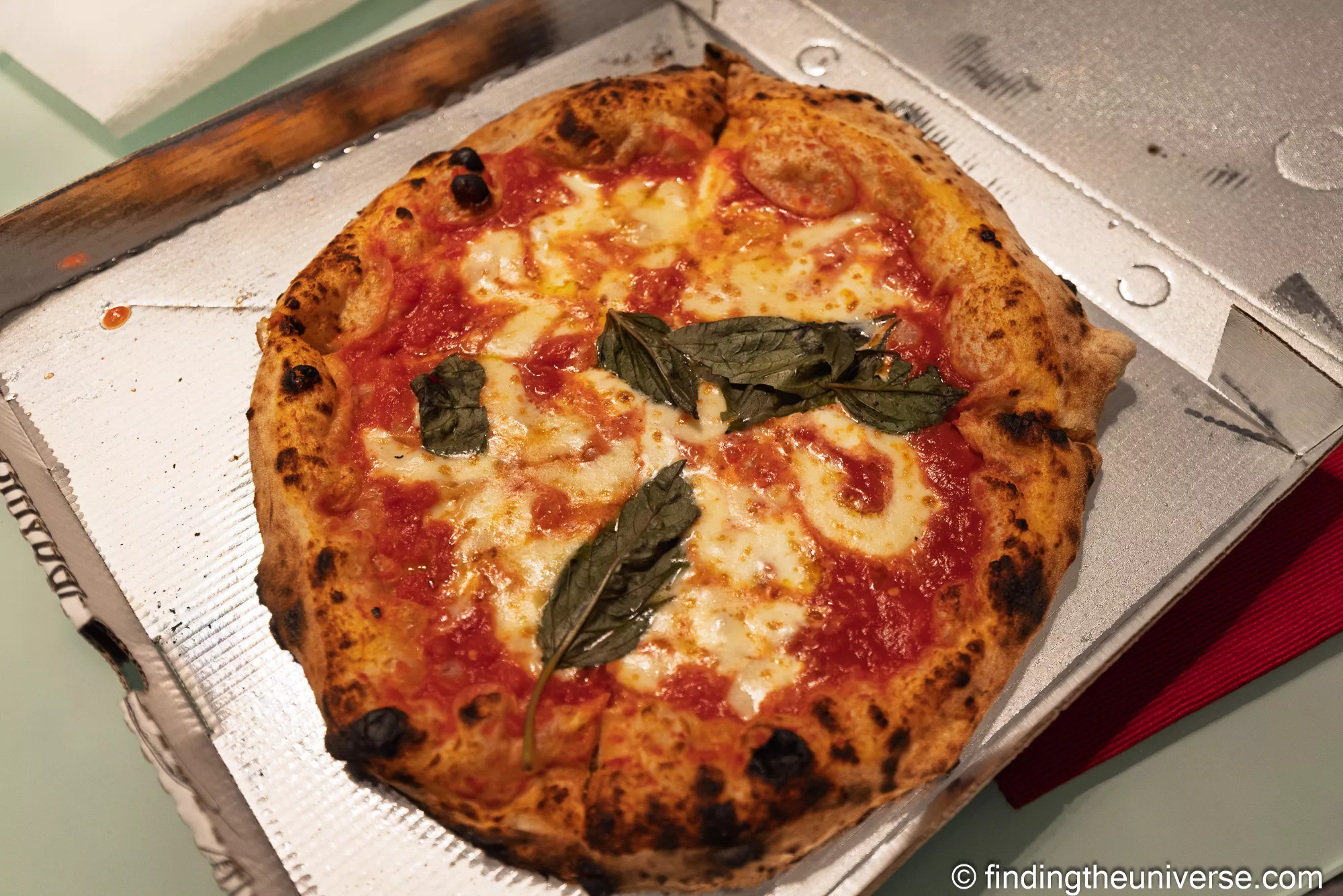 A margherita pizza at Pizzeria Carmnella in Naples